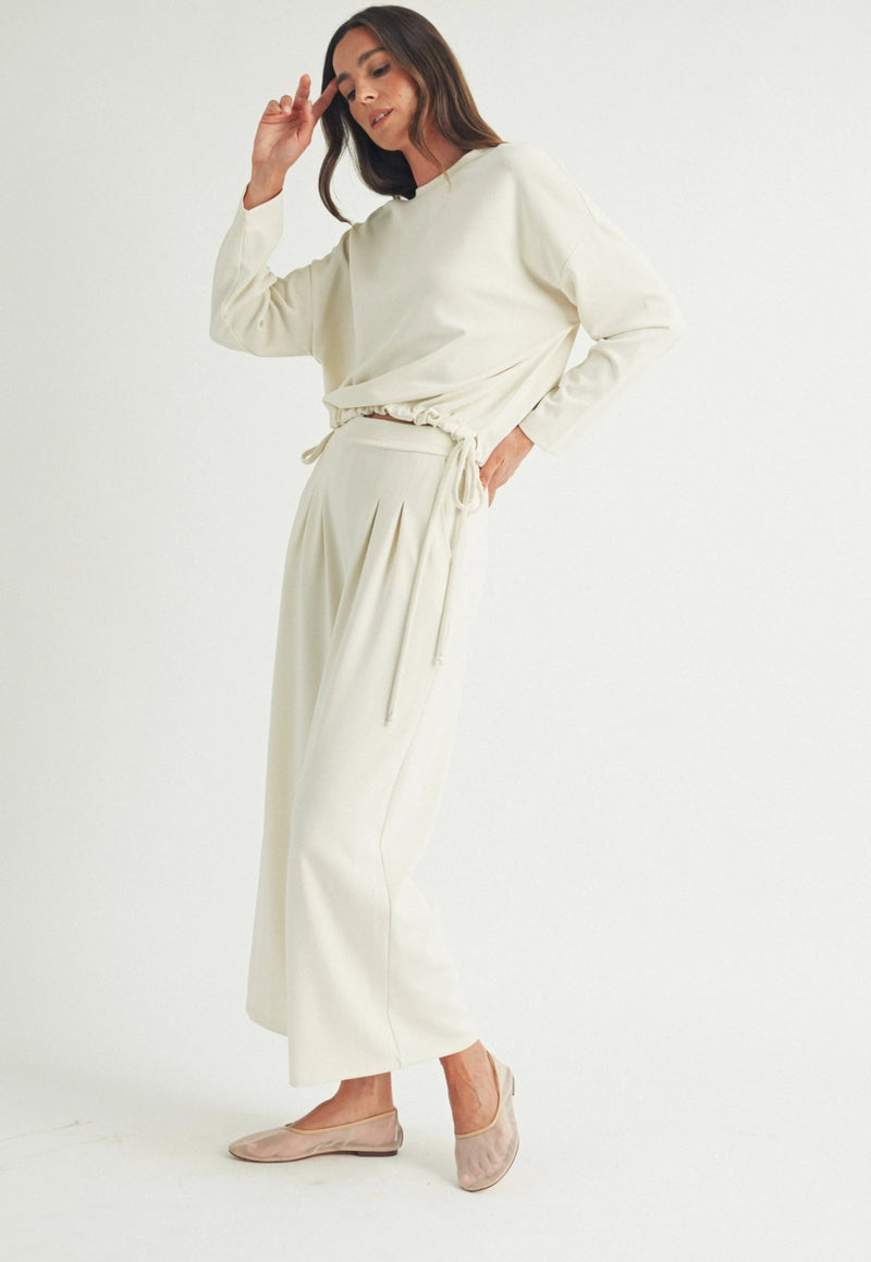 PLEATED WIDE LEG SWEATPANTS