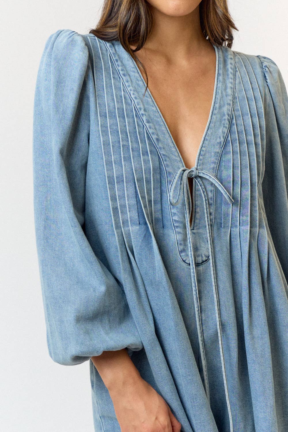 PLEATED FRONT TIE DENIM ROMPER W/ POCKETS